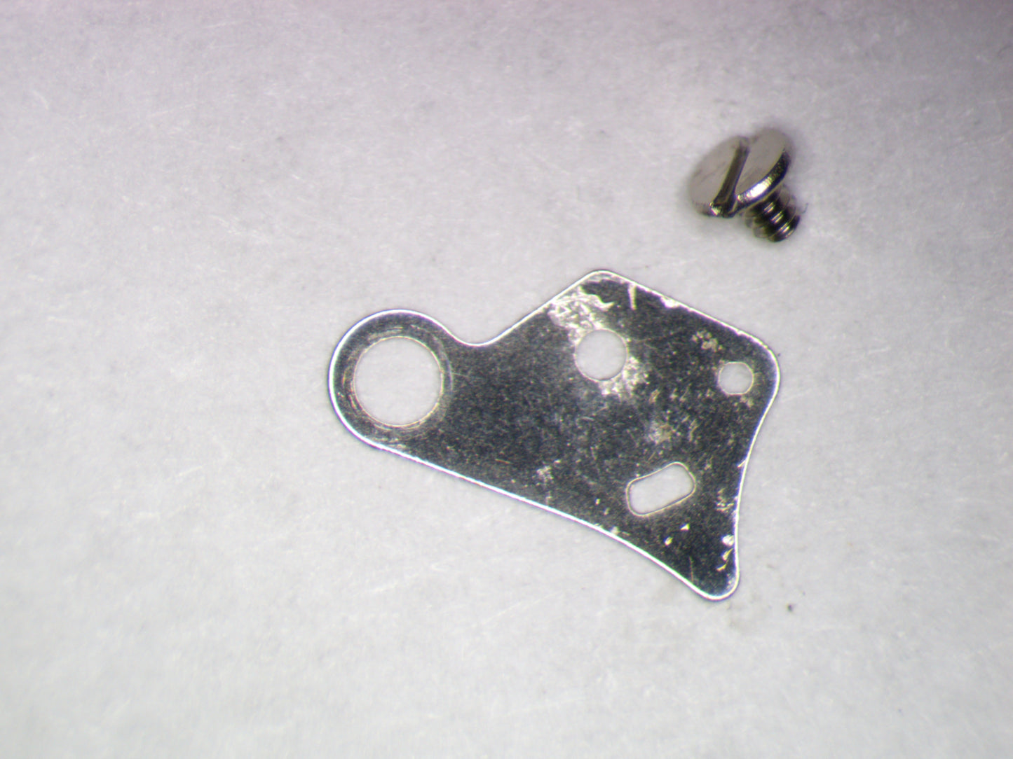Seiko NH36A 436166 Lower plate barrel train bridge w/screw