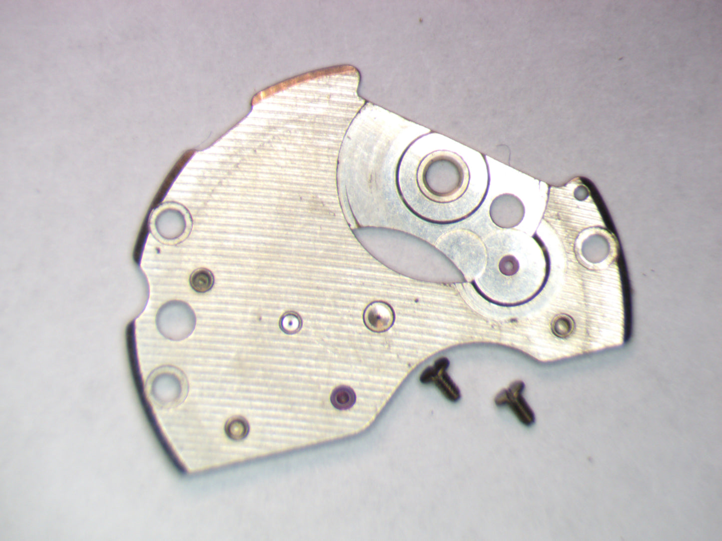 Seiko 6309A 112601 Barrel and train wheel bridge w/screws