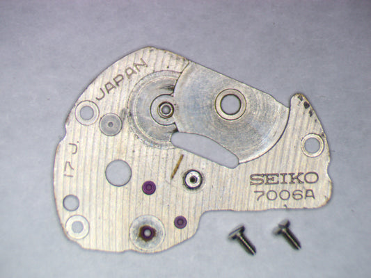 Seiko 7006A 112020 Barrel and train wheel bridge w/screws