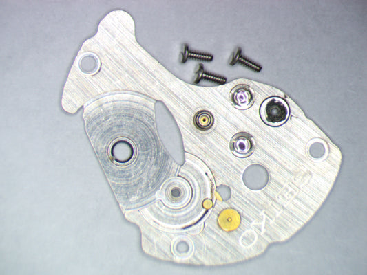 Seiko 7S36C 0114178 Barrel and train wheel bridge w/screws