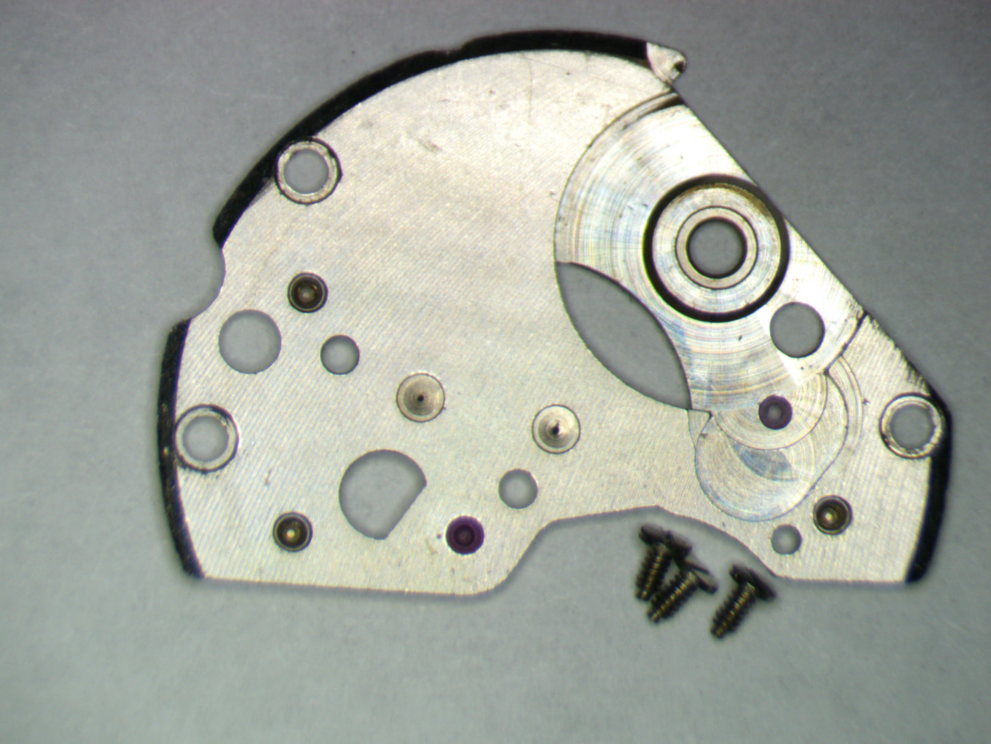 Seiko 6117A 112619 Barrel and train wheel bridge w/screws