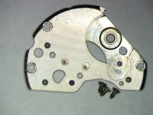 Seiko 6117A 112619 Barrel and train wheel bridge w/screws
