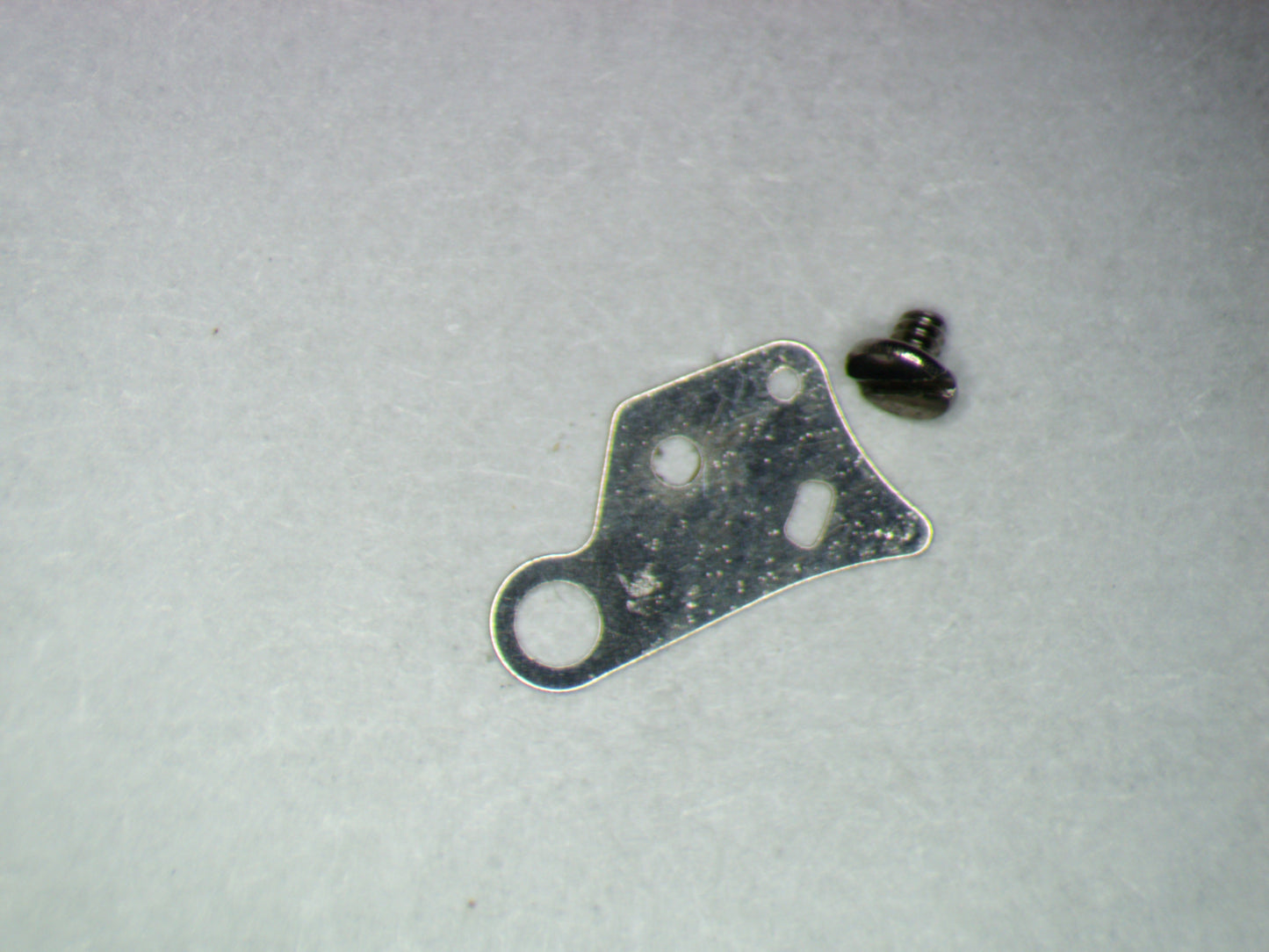 Seiko 4R34 0436166 Lower plate barrel train bridge w/screw